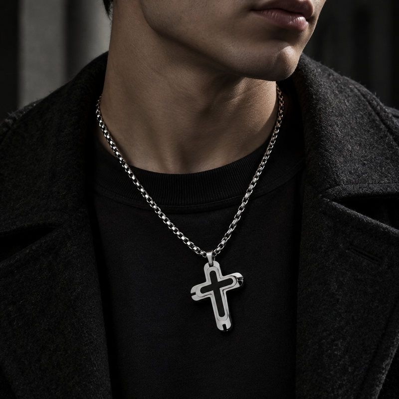 Model wearing men's aerodynamic black cross pendant necklace with black wool coat
