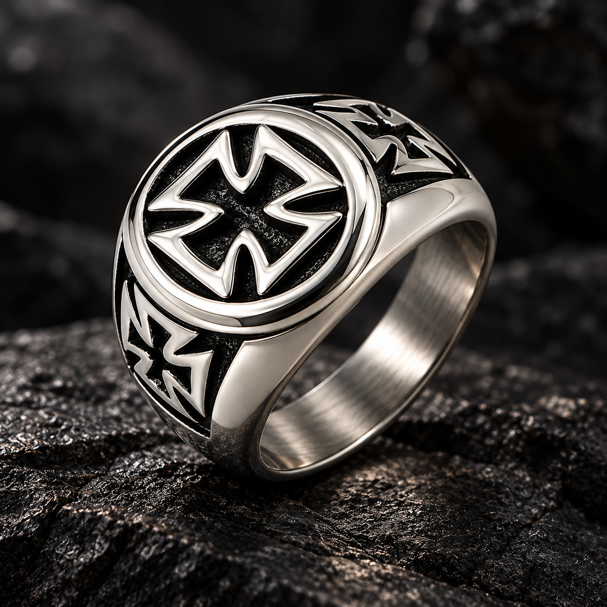 Men's Iron Cross Biker Ring displayed on rugged black volcanic rock
