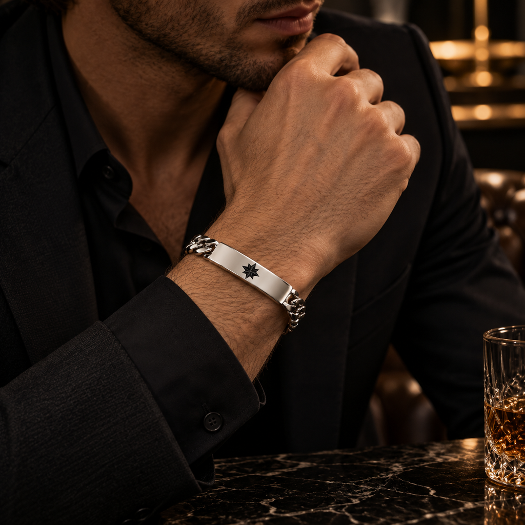 Model wearing men's stainless steel North Star ID bracelet with formal black suit
