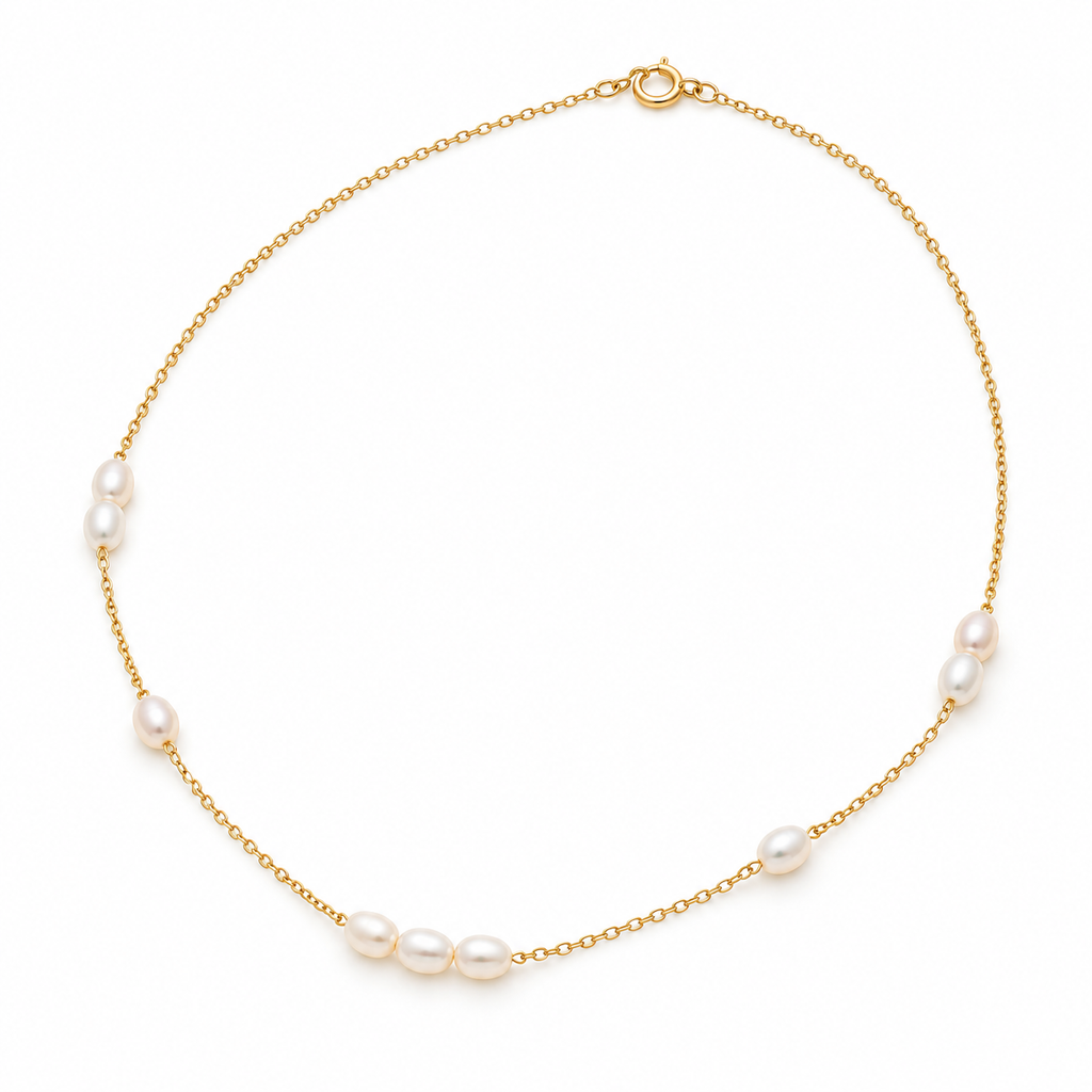 Full view of 18K gold plated chain with stationed freshwater pearls and spring clasp on white background
