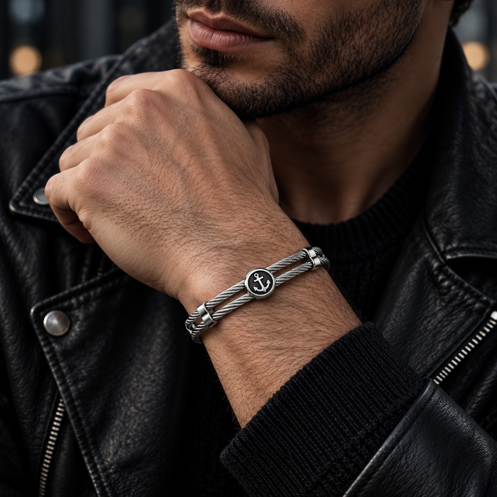 Model wearing men's steel cable anchor medallion bracelet with black leather jacket
