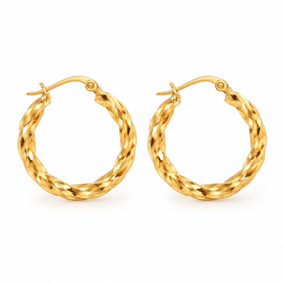 Pair of women's diamond-cut twisted gold hoop earrings in polished stainless steel on white background
