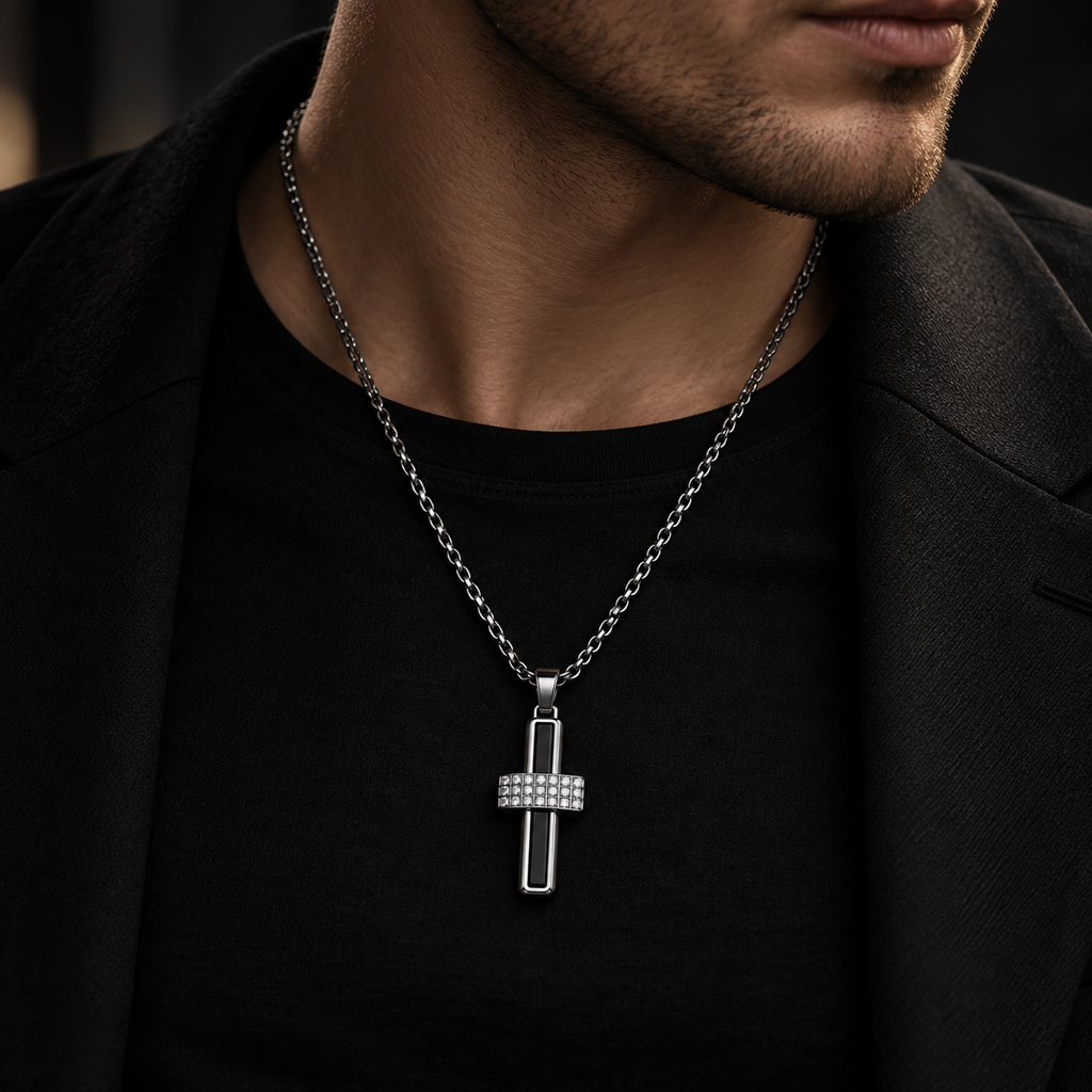 Model wearing men's pavé crystal and black inlay cross pendant necklace with black suit
