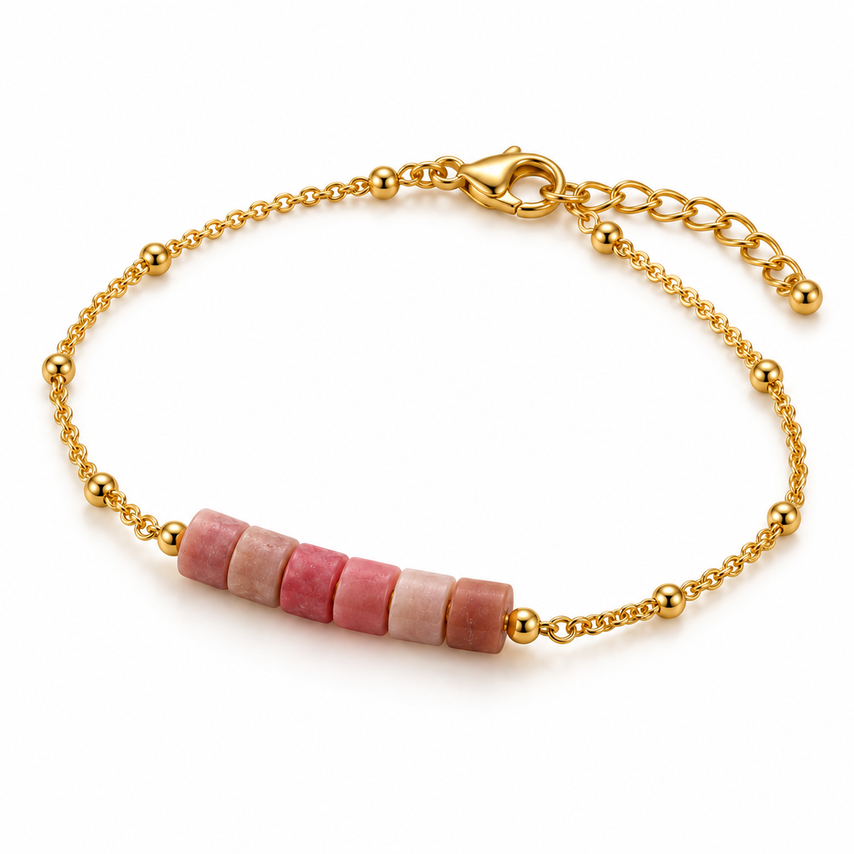 Overhead product flat lay of the pink rhodonite cylinder bead bar bracelet showing the adjustable extender chain and polished gold beads.
