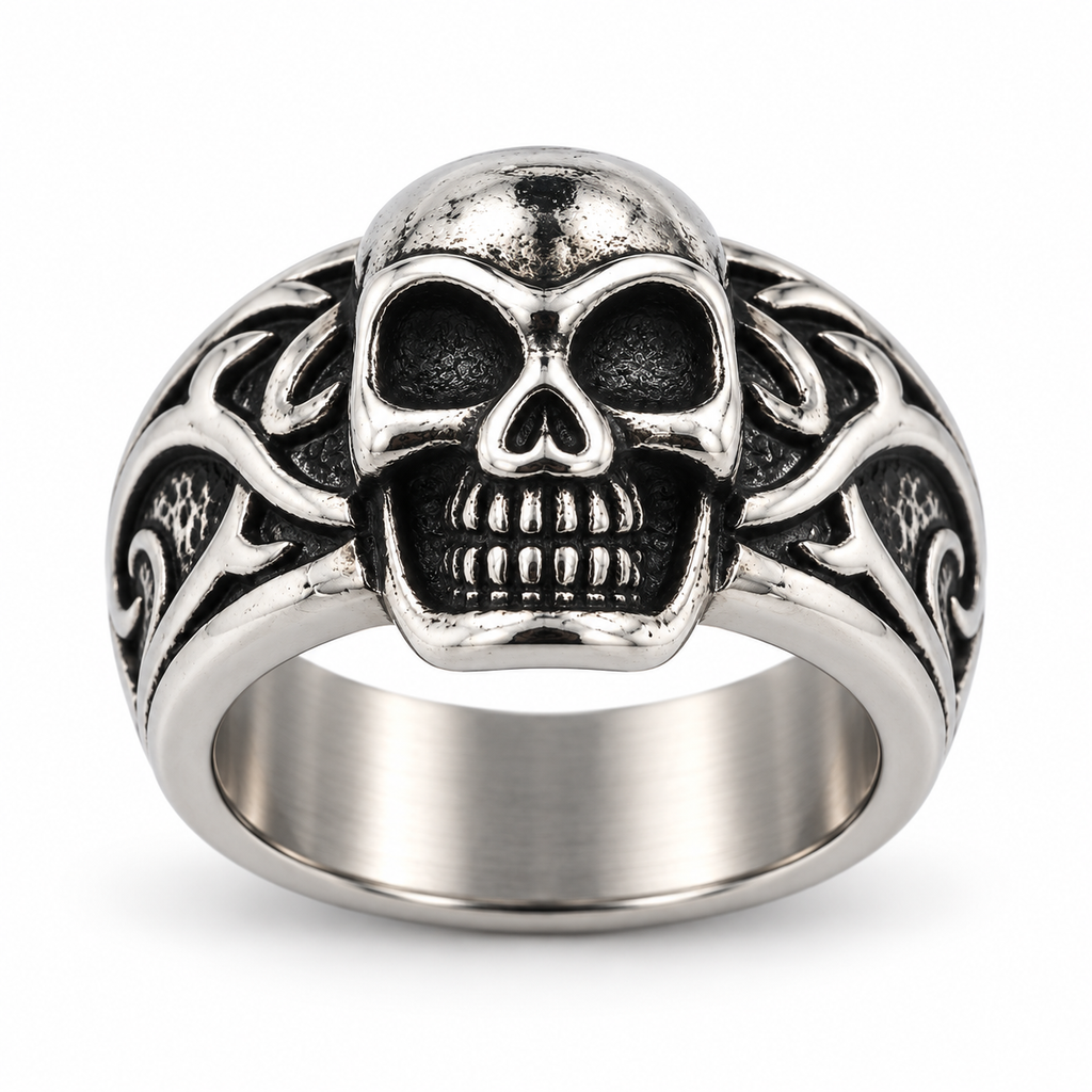 Vintage stainless steel skull ring with intricate carved gothic details
