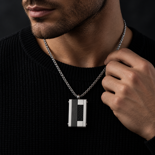 Model wearing men's carbon fiber and black steel dog tag necklace with black knit sweater
