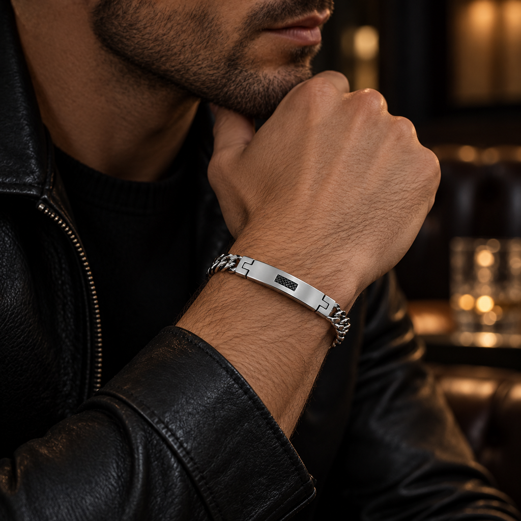 Model wearing men's steel curb chain ID bracelet with black leather jacket
