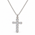 Women's sparkling clear CZ crystal cross pendant necklace in silver stainless steel close-up view
