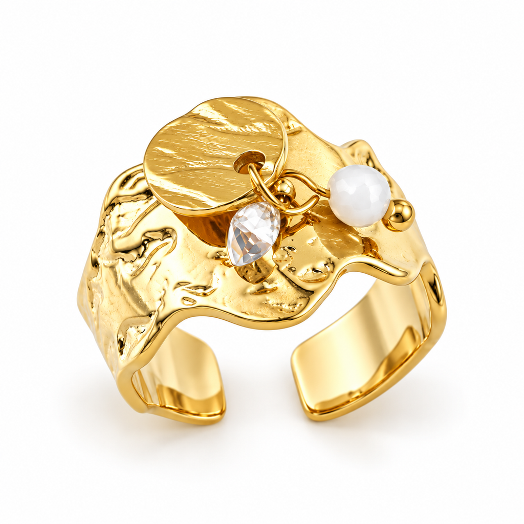 Angled studio view of molten textured gold open adjustable statement ring with multi-charm dangle cluster
