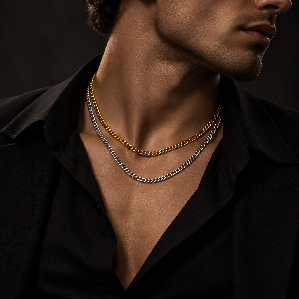 Model wearing men's stainless steel Cuban chain necklace with unbuttoned black shirt
