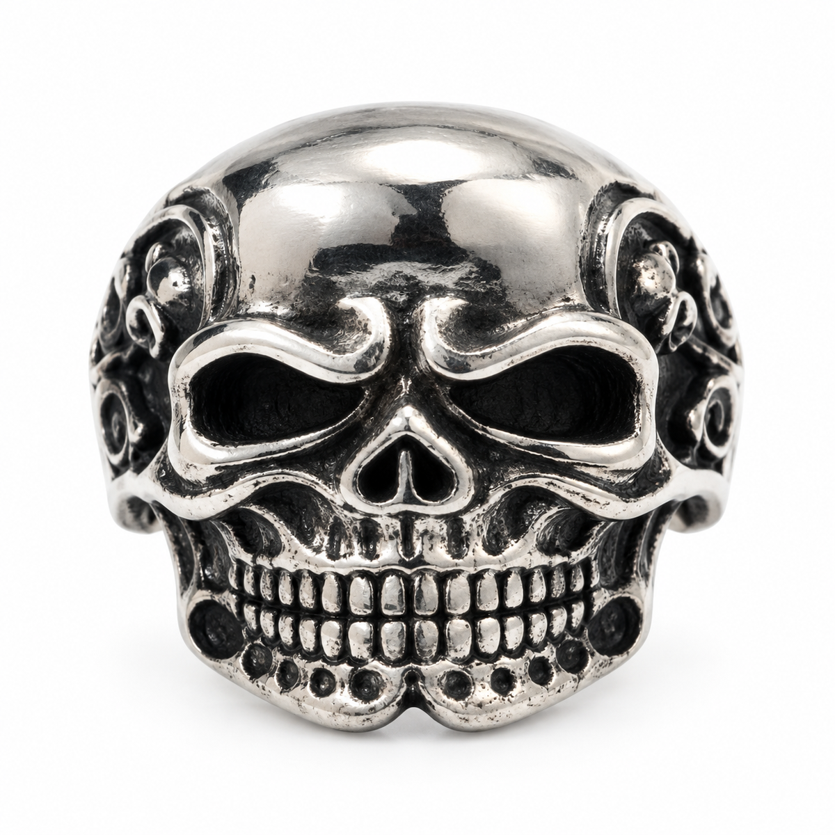 Side profile of baroque scrollwork on gothic skull ring temple
