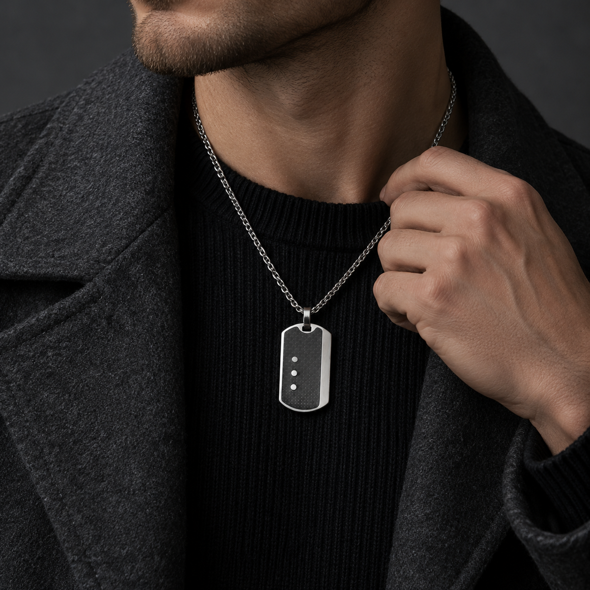 Model wearing men's modern steel dog tag pendant necklace with charcoal wool coat
