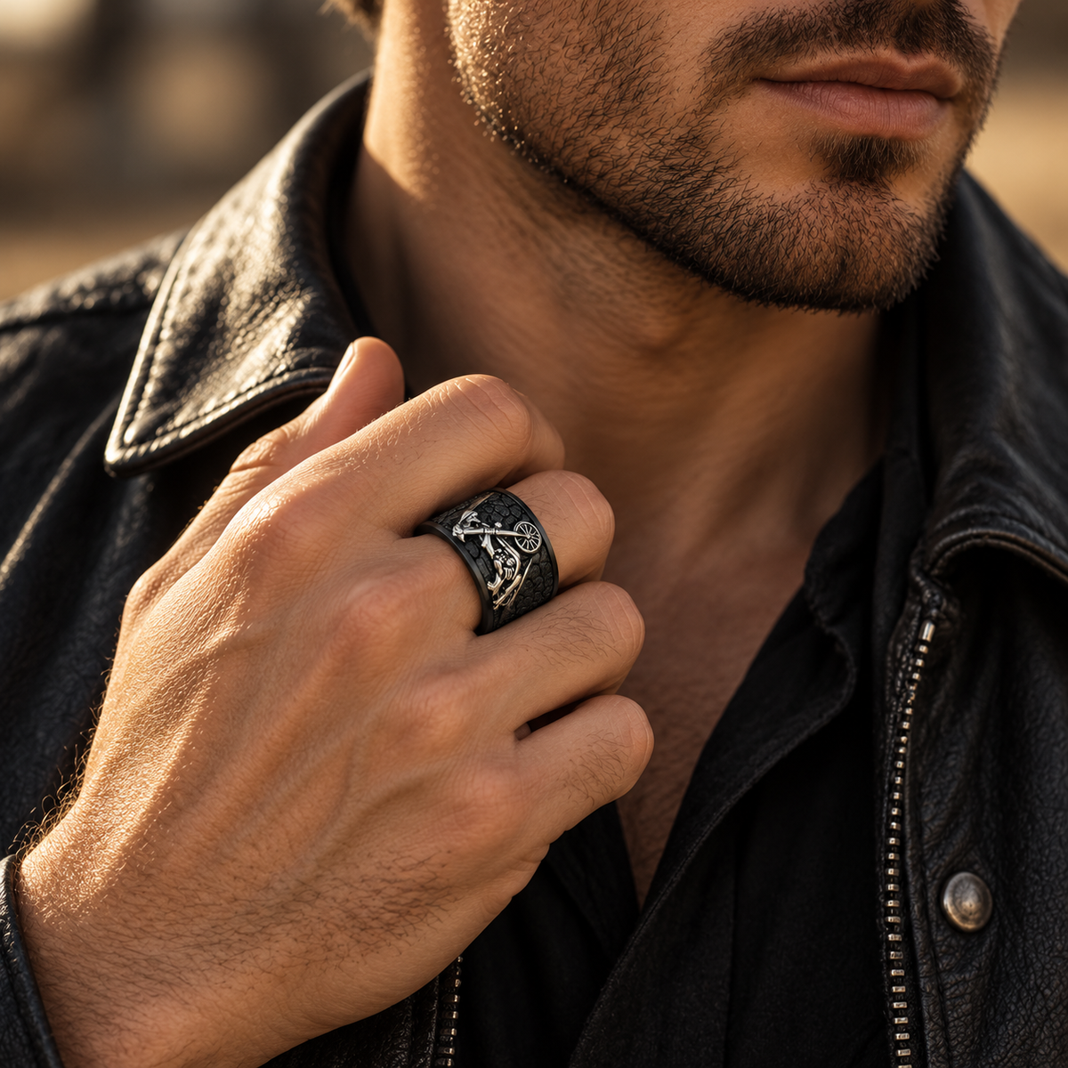 Model wearing two-tone steampunk skeleton bicycle ring on hand
