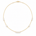 Women's 18K gold plated stainless steel freshwater pearl station choker necklace on white background
