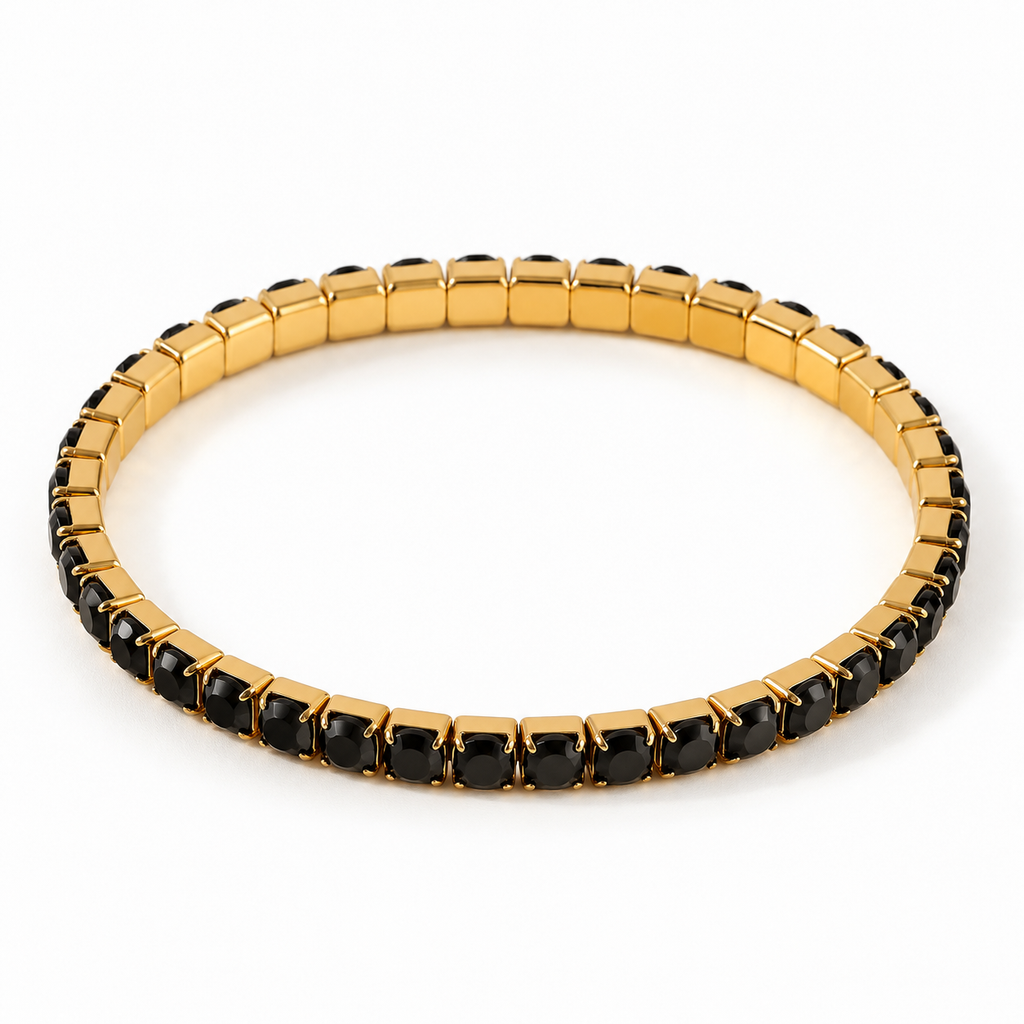 Women's stretch tennis bangle bracelet featuring square cut black cubic zirconia stones in 18K gold plated prong settings.
