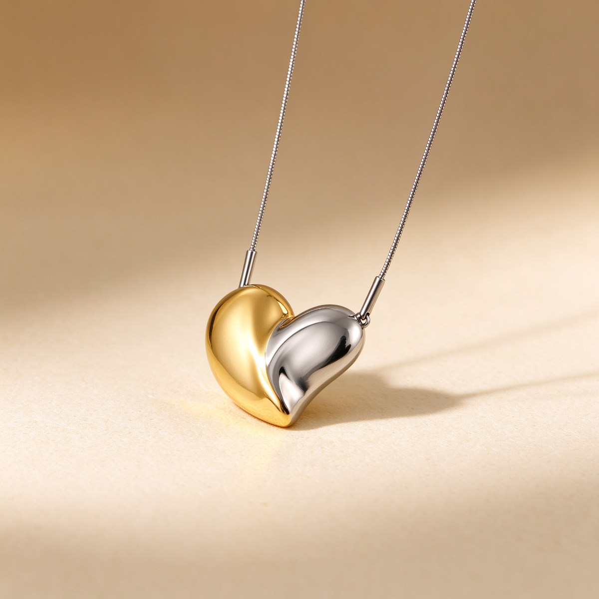 Women's Modern Two-Tone Curved Puffed Heart Pendant Necklace – Stainless Steel Snake Chain Jewelry