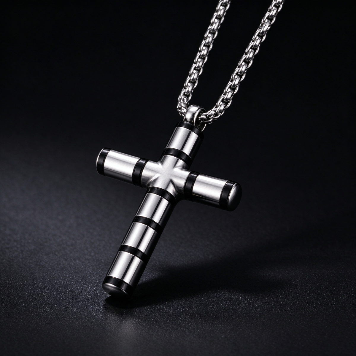 Men's cylindrical segmented cross pendant necklace collection in black and gold accents

