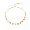 18K gold plated stainless steel dainty multi-disc charm choker necklace flat lay on white background