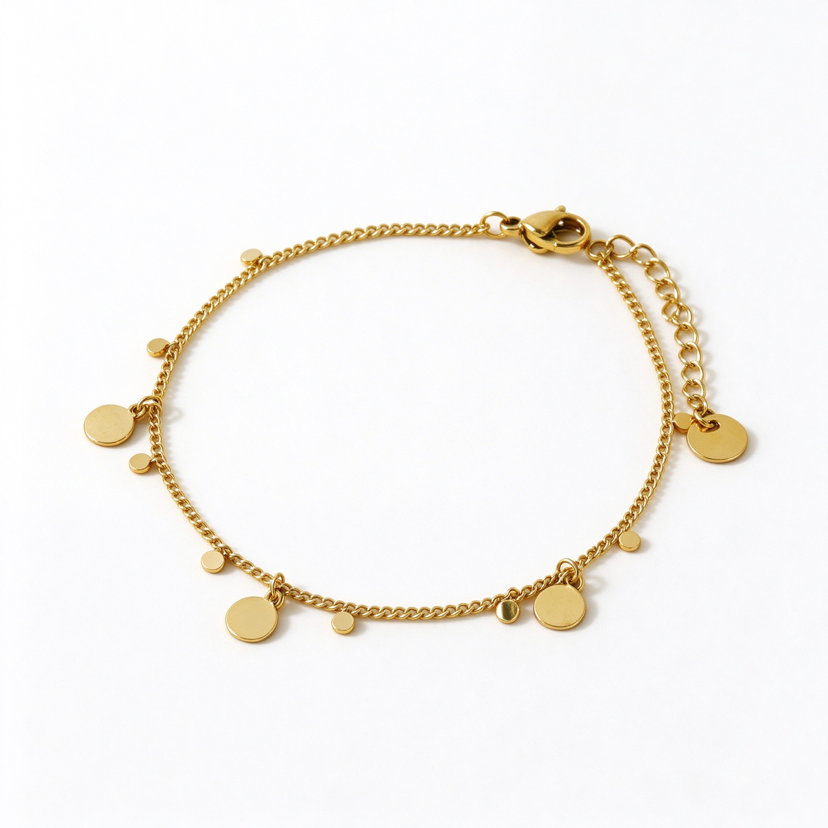 Women's 18K gold plated stainless steel chain bracelet with hanging polished disc charms on white background
