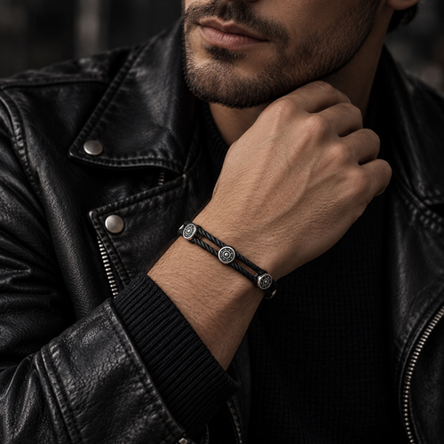 Model wearing men's black cable triple medallion bracelet with black leather jacket

