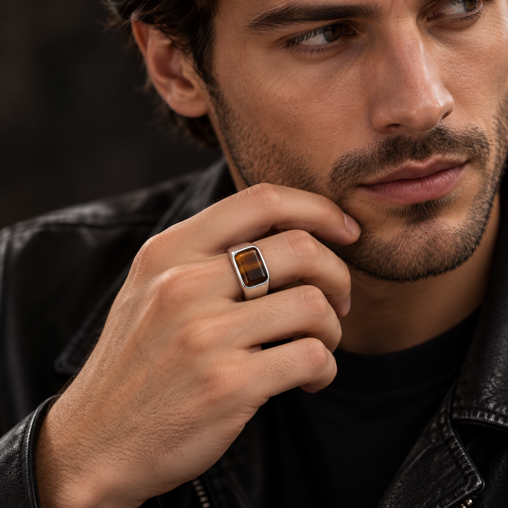 Angled view of clean architectural stainless steel gemstone ring
