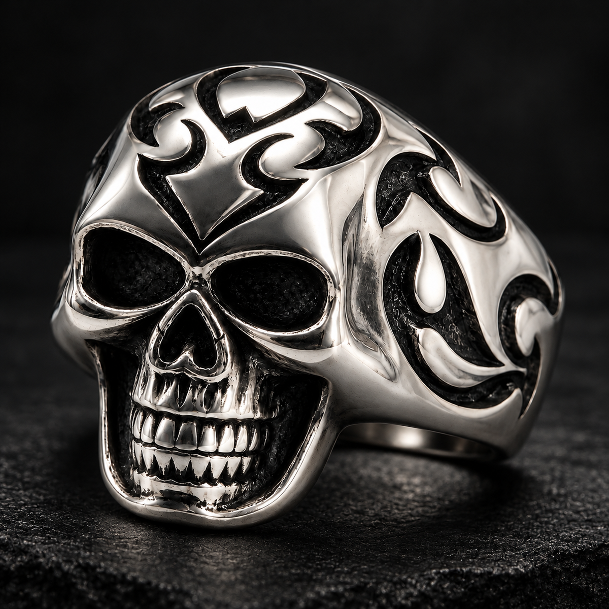 Angled view of heavy-duty polished stainless steel biker skull ring
