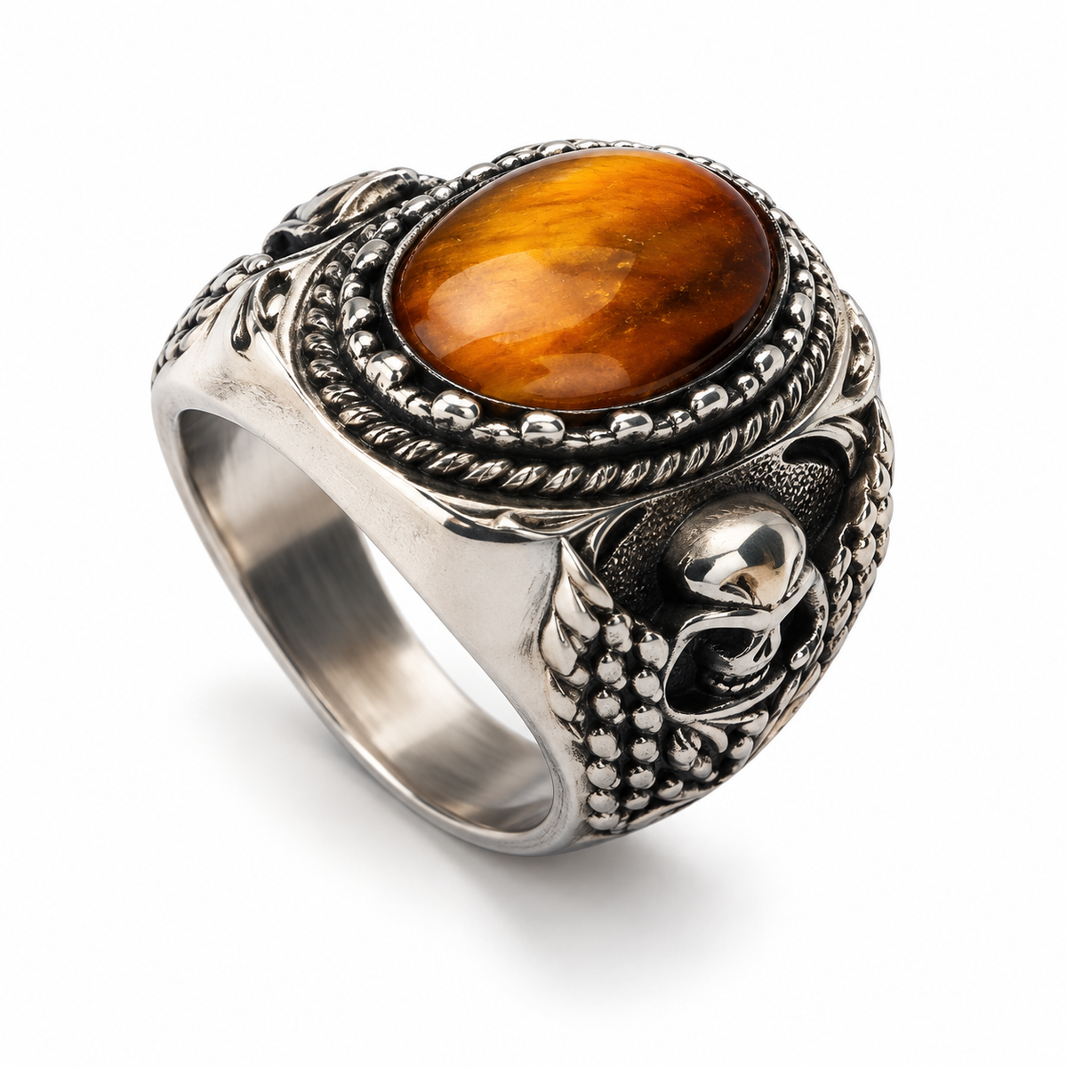 Side view showing detailed 3D sculpted skull on gemstone ring shank
