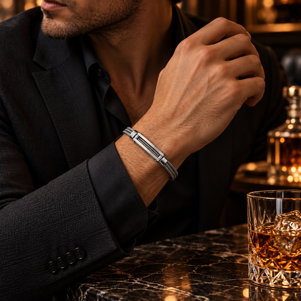 Model wearing men's stainless steel wire cable bracelet with formal black suit
