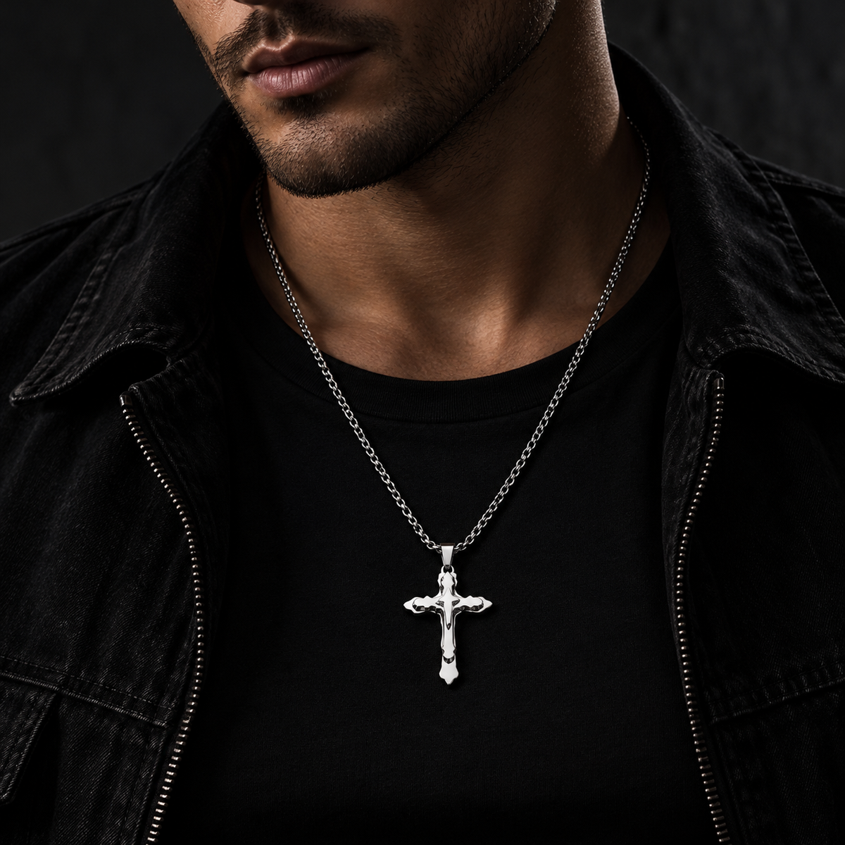 Model wearing men's all-silver gothic star cross pendant necklace on dark chain
