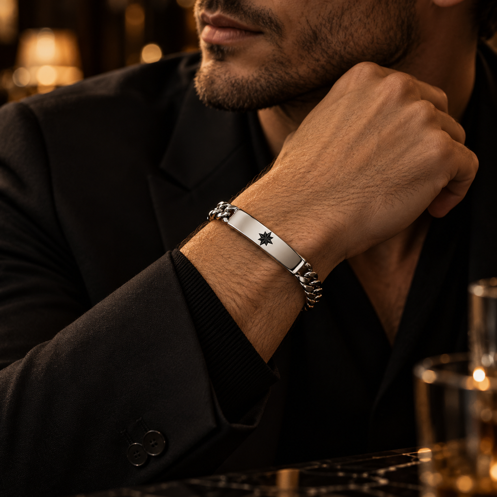 Model wearing men's steel Cuban link ID bracelet with black tailored blazer

