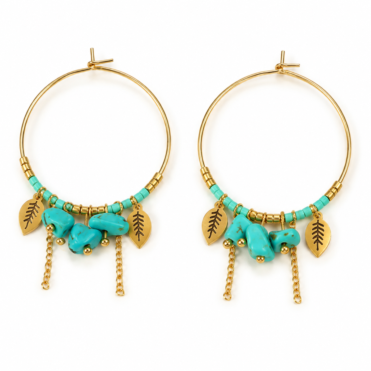 Pair of women's boho gold hoop earrings with turquoise stone beads, leaf charms, and dangling chain tassels on white background
